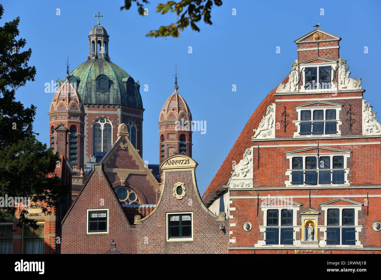The colorful facades of historic houses located along Kerkstraat street in the city center of Hoorn, West Friesland, Netherlands Stock Photo