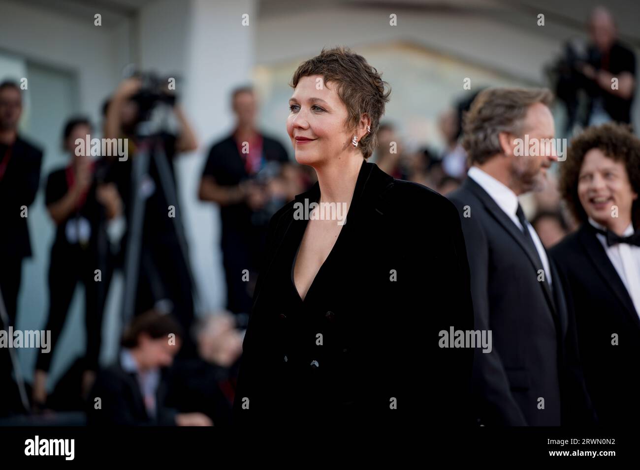 VENICE, ITALY - SEPTEMBER 09:  Maggie Gyllenhaal attends a red carpet ahead of the closing ceremony at the 80th Venice International Film Festival on Stock Photo