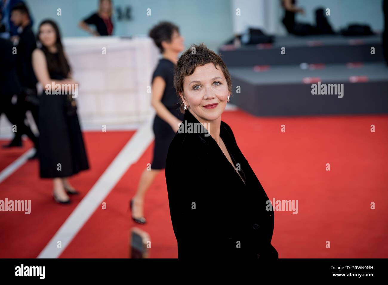 VENICE, ITALY - SEPTEMBER 09:  Maggie Gyllenhaal attends a red carpet ahead of the closing ceremony at the 80th Venice International Film Festival on Stock Photo