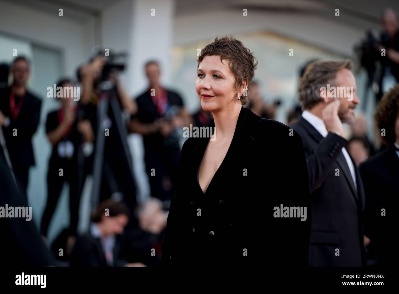 VENICE, ITALY - SEPTEMBER 09:  Maggie Gyllenhaal attends a red carpet ahead of the closing ceremony at the 80th Venice International Film Festival on Stock Photo