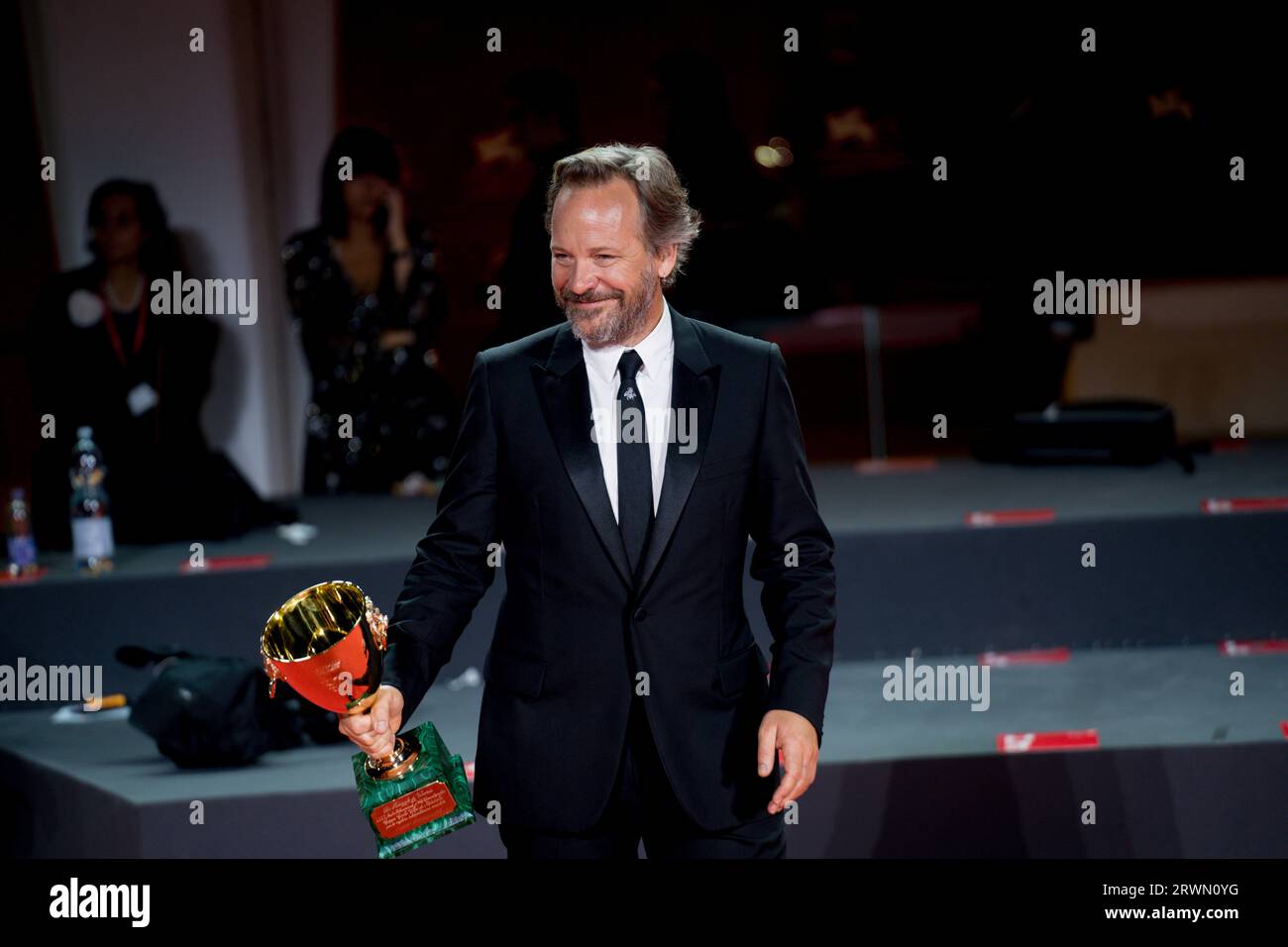 VENICE, ITALY - SEPTEMBER 09: Peter Sarsgaard poses with the Best Actor Award for 'Memory' at the winner's photocall at the 80th Venice International Stock Photo
