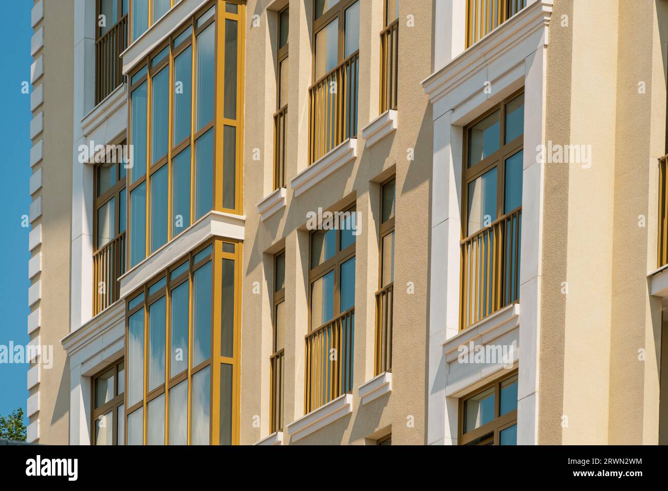 New building facade in housing complex. Modern style in architecture ...