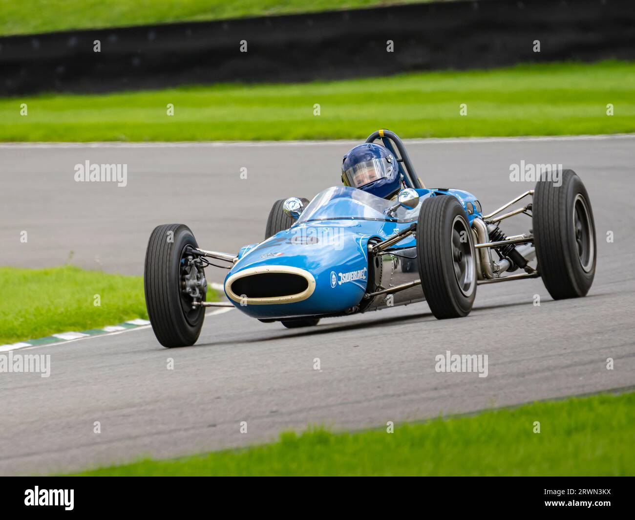 Lotus Climax 25 F1 car on track during testing at the Goodwood Revival, West Sussex UK Stock Photo