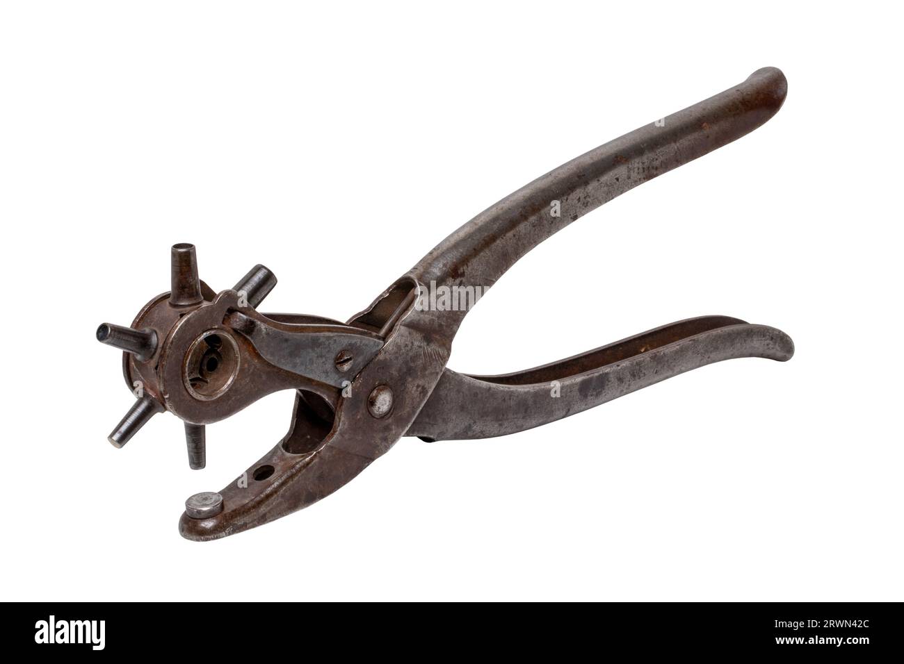 Tailoring accessories. Closeup of a antique adjustable Steel punch pliers or hole punch tool isolated. Clipping path. Tools from tailor, saddler or co Stock Photo