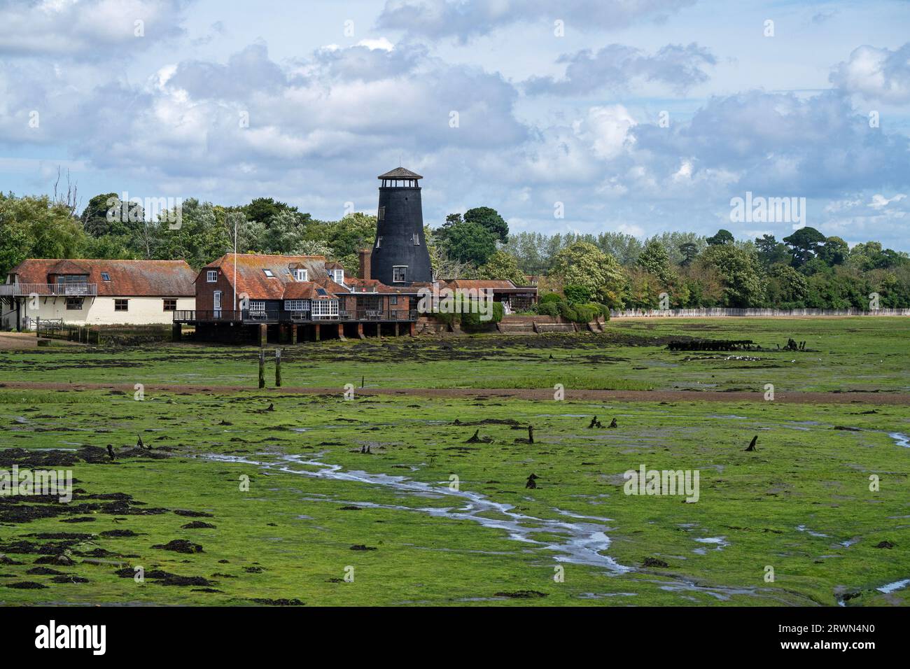 The Old Mill at Langstone Quay, Chichester Harbour on the Solent, Hampshire, England, UK Stock Photo