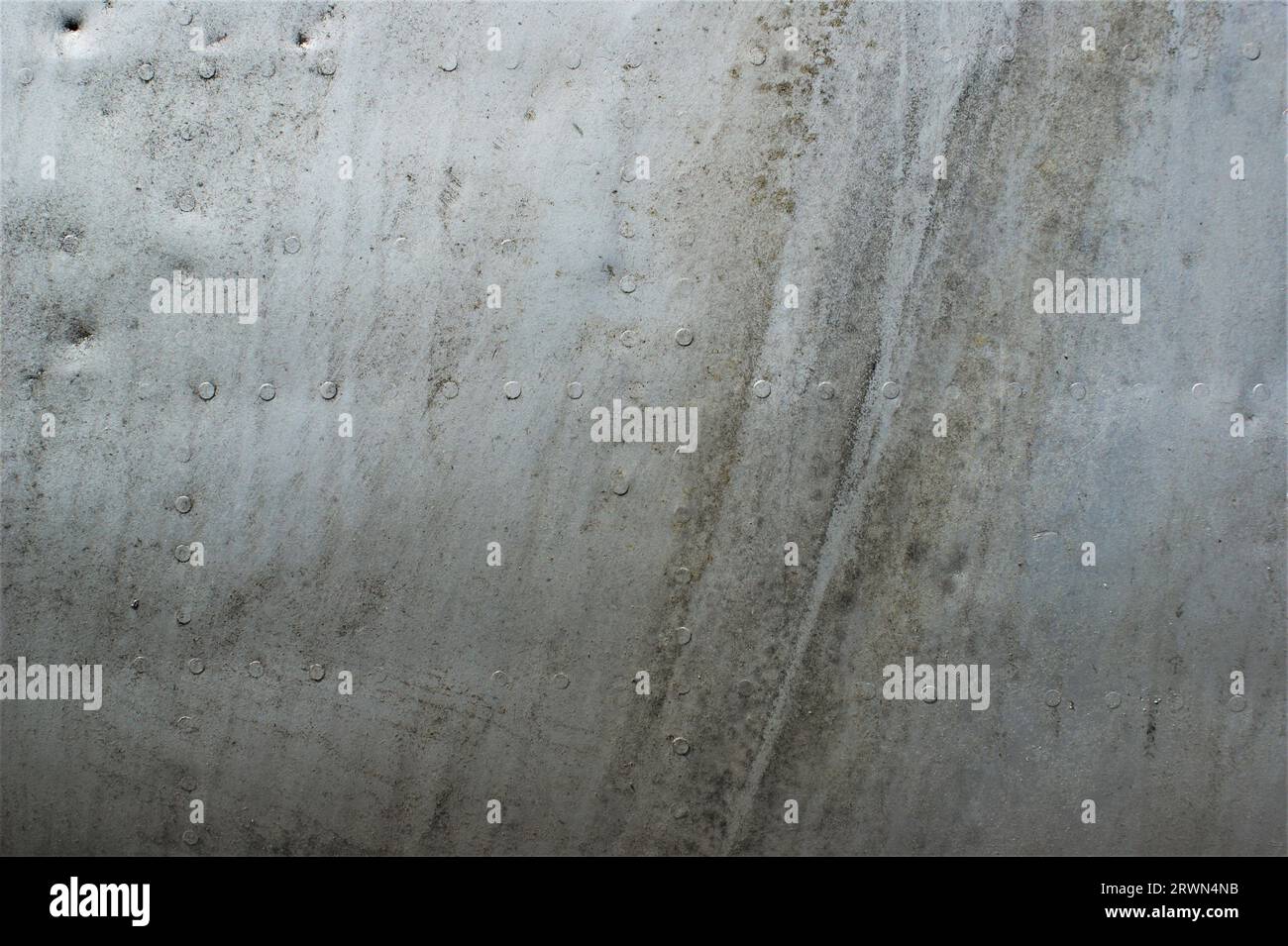 Light Aircraft Rusting Old dirty fuselage with traces of corrosion. A fragment of the aluminum ...