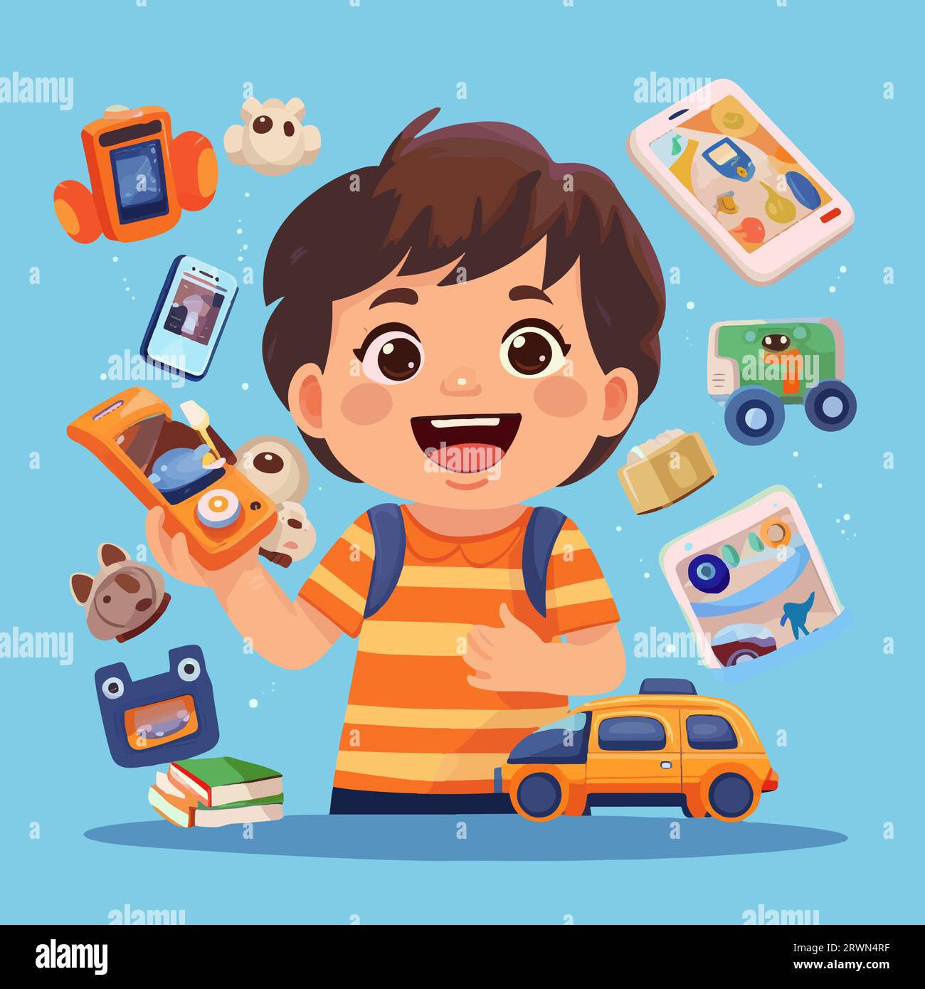Happy little kid playing with toys and smiling. Young boy feeling excited about his presents - Stock Image