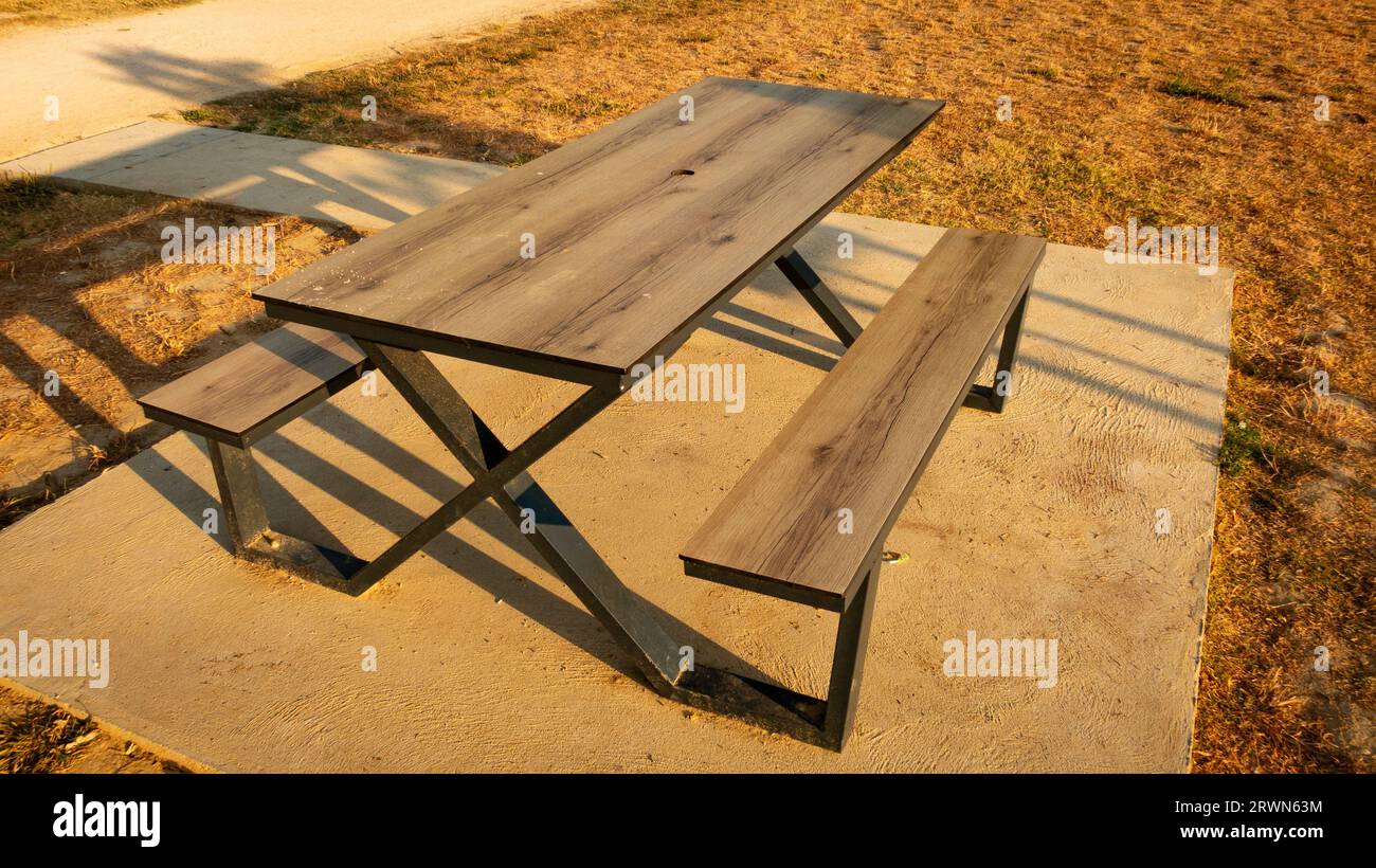 Picnic table at sunset Stock Photo