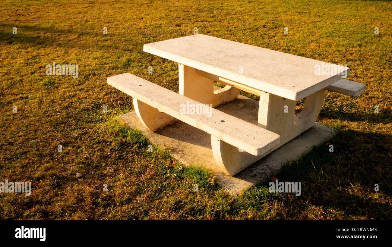 Picnic table at sunset Stock Photo