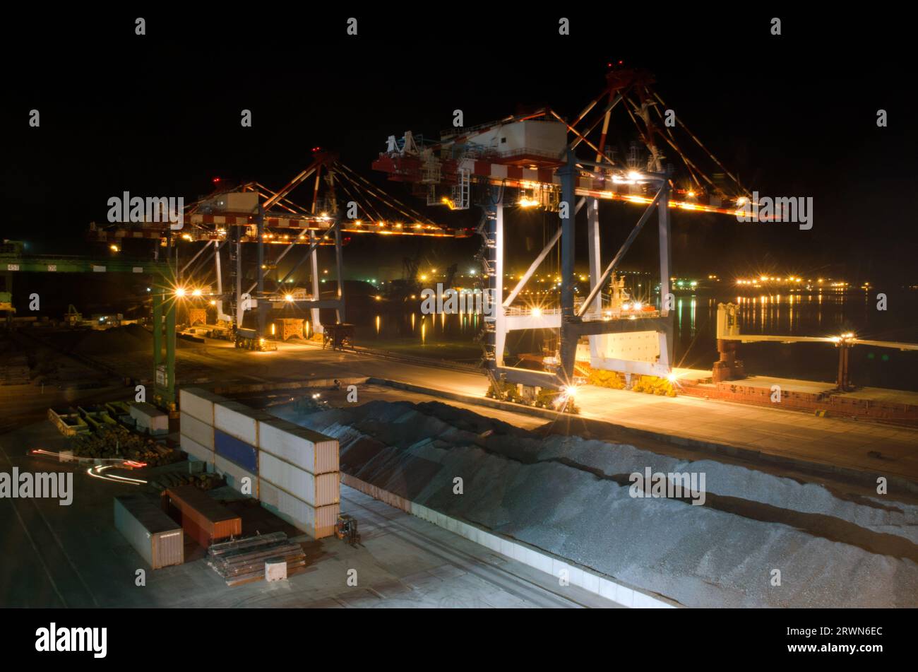 Container terminal. Sea port container terminal during work at night in ...