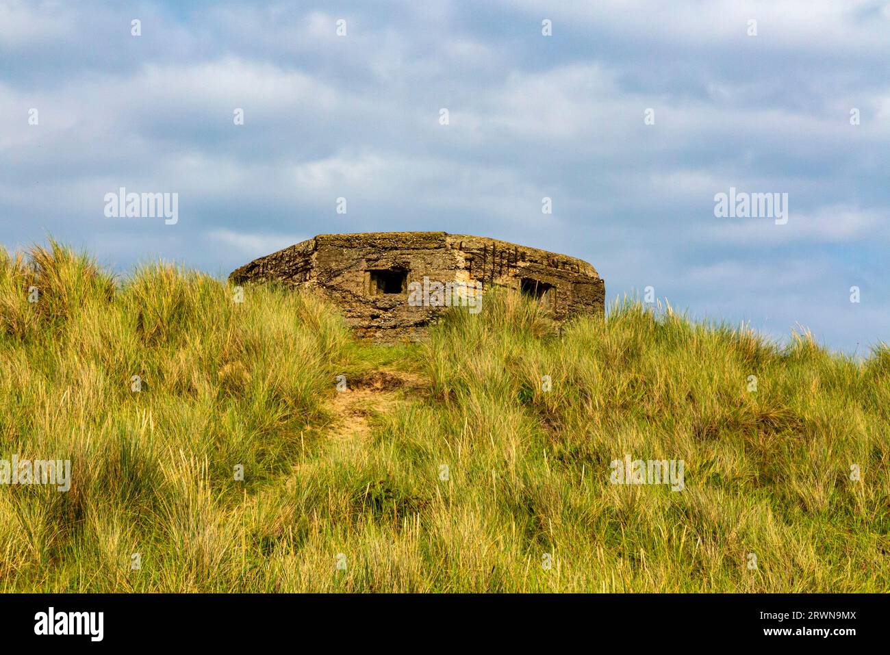 Second World War pill box on Horsey beach Norfolk England UK built as a defensive structure c1940 as part of the British anti invasion preparations. Stock Photo
