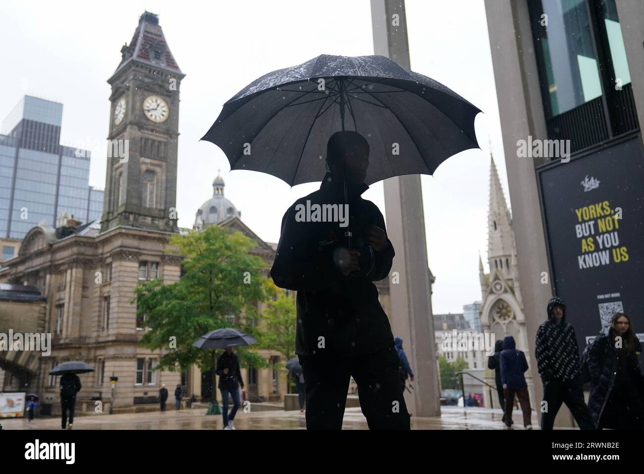 People walk by Chamberlain Square, Birmingham, after Communities Secretary Michael Gove outlined plans to appoint commissioners to take over Birmingham City Council and to launch an inquiry into the cash-strapped authority. Picture date: Wednesday September 20, 2023. Stock Photo