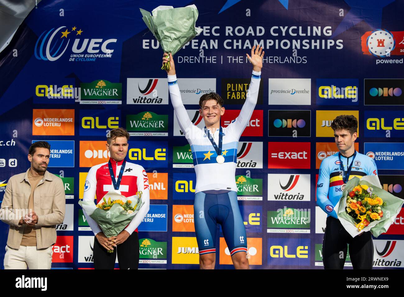Nieuw Amsterdam, Netherlands. 20th Sep, 2023. Dutch former cyclist Tom Dumoulin, Silver medal winner Swiss Stefan Bissegger of EF Education-EasyPost, gold medal winner British Josh Tarling of Ineos Grenadiers and bronze medal winner Belgian Wout van Aert celebrate on the podium of the elite men individual time trial at the UEC Road European Championships, a 29,5km track in Emmen, The Netherlands, Wednesday 20 September 2023. The European cycling championships takes place from 20 to 24 september. BELGA PHOTO DAVID PINTENS Credit: Belga News Agency/Alamy Live News Stock Photo