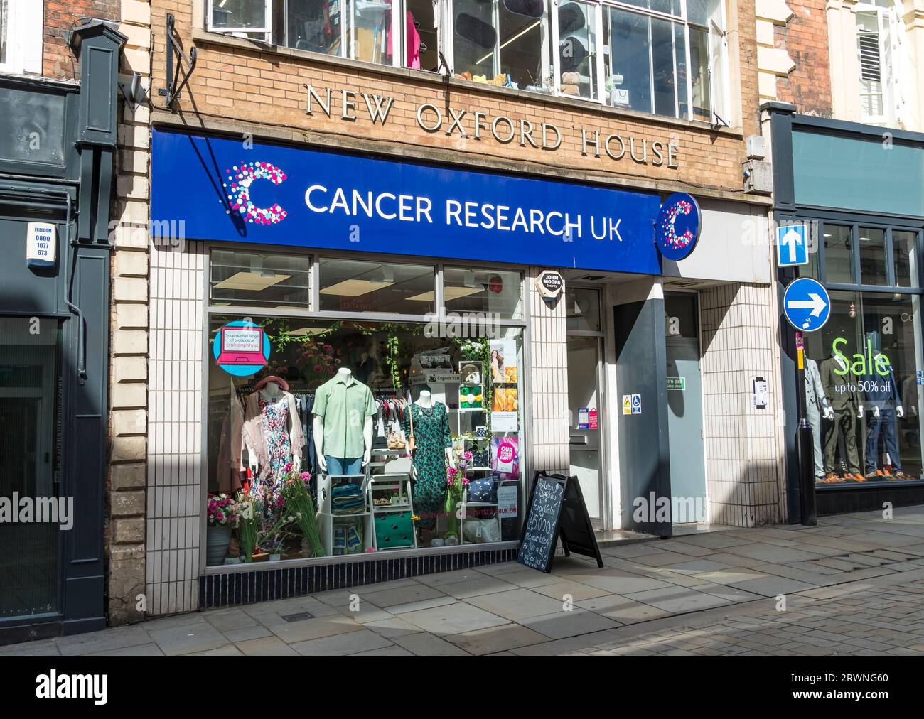 Cancer Research UK charity shop, High Street, Lincoln City, Lincolnshire, England, UK Stock Photo