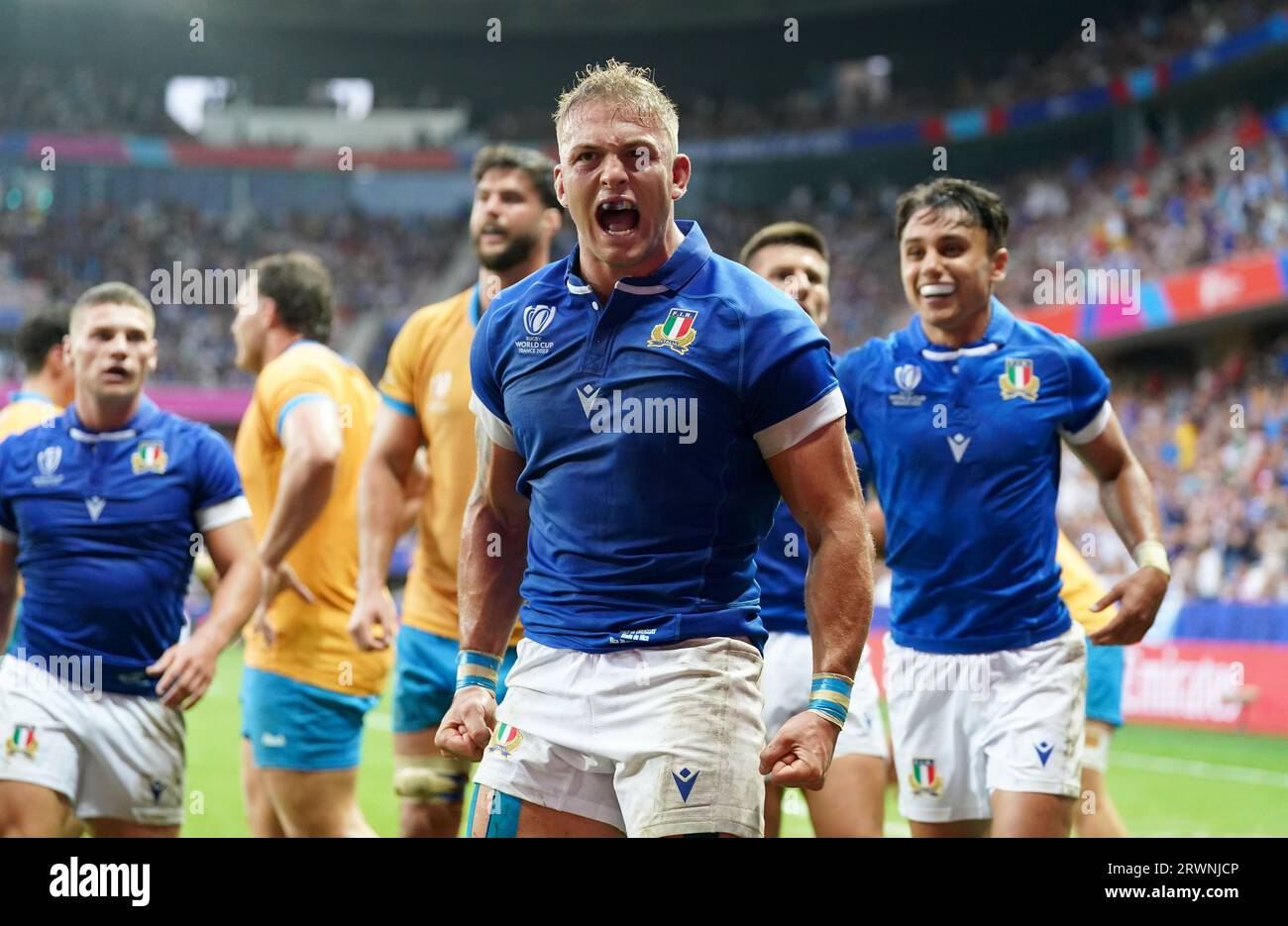Italy's Lorenzo Cannone celebrates scoring their fourth try during the ...