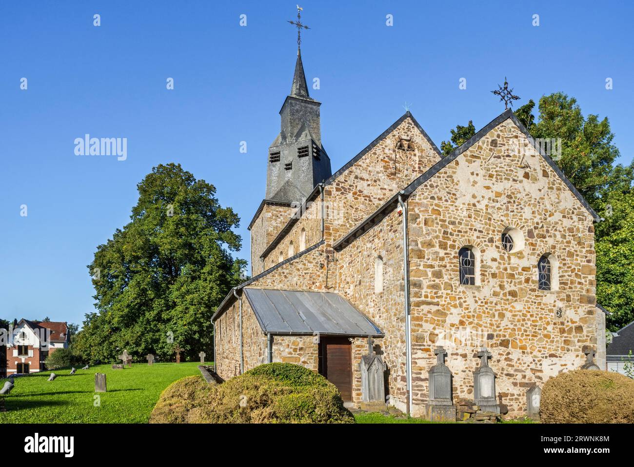 11th century Romanesque Saint Etienne church in the village Waha, Marche-en-Famenne in the province of Luxembourg, Belgian Ardennes, Wallonia, Belgium Stock Photo