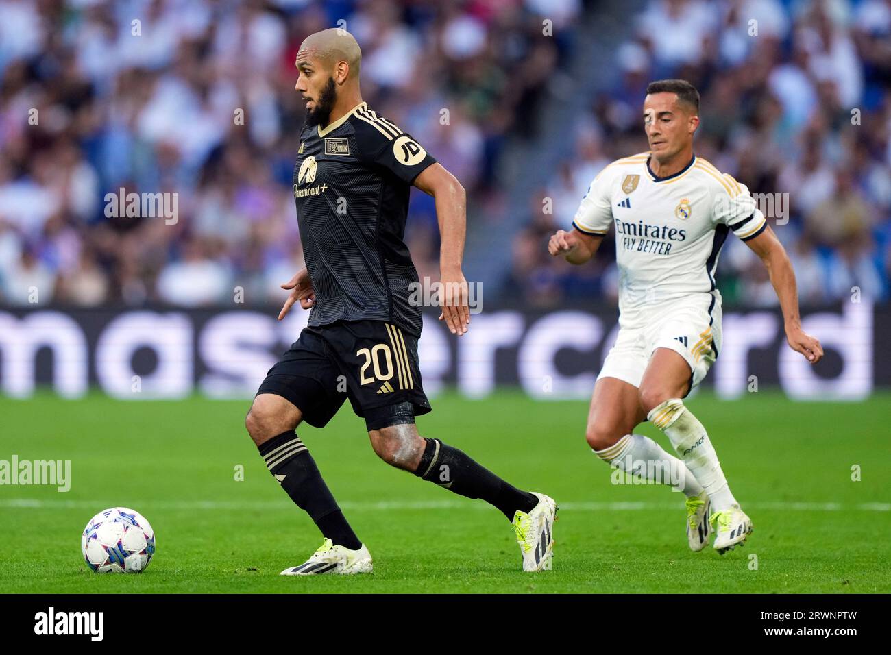 Madrid, Spain. 20th Sep, 2023. Aissa Laidouni of FC Union Berlin and Lucas Vazquez of Real Madrid CF during the UEFA Champions League match, Group C, between Real Madrid and Union Berlin played at Santiago Bernabeu Stadium on September 20, 2023 in Madrid, Spain. (Photo by Cesar Cebolla/PRESSINPHOTO) Credit: PRESSINPHOTO SPORTS AGENCY/Alamy Live News Stock Photo