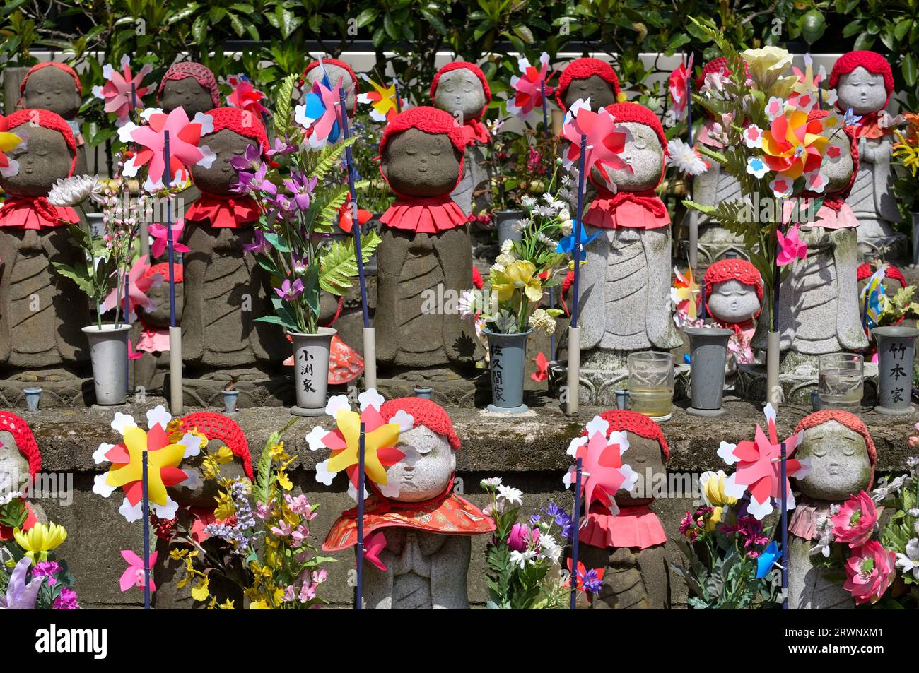 Jizo Bosatsu Statues at the Zojo-ji Temple near the Tokyo Tower, Tokyo JP Stock Photo