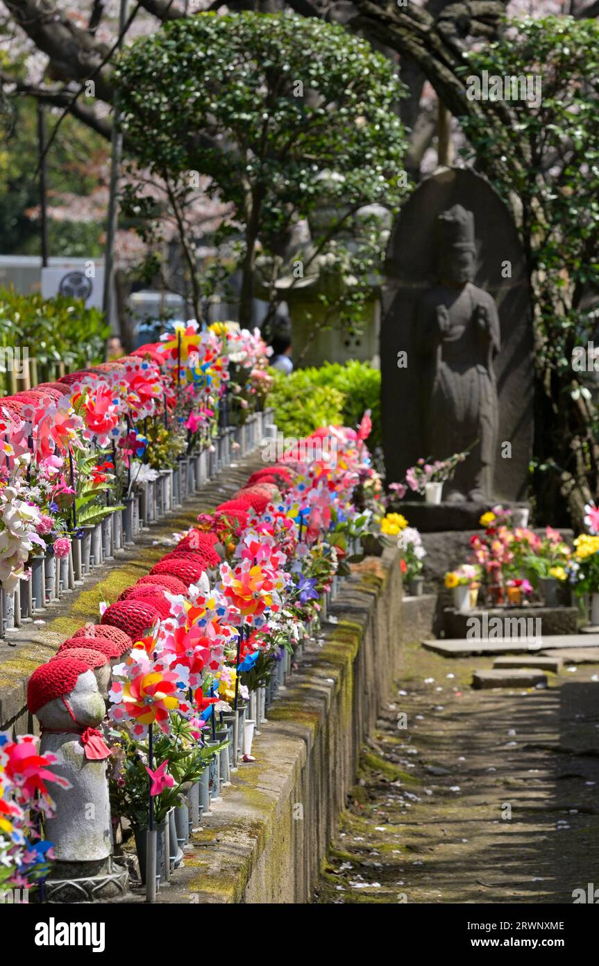 Jizo Bosatsu Statues in spring at the Zojoji Temple near the Tokyo