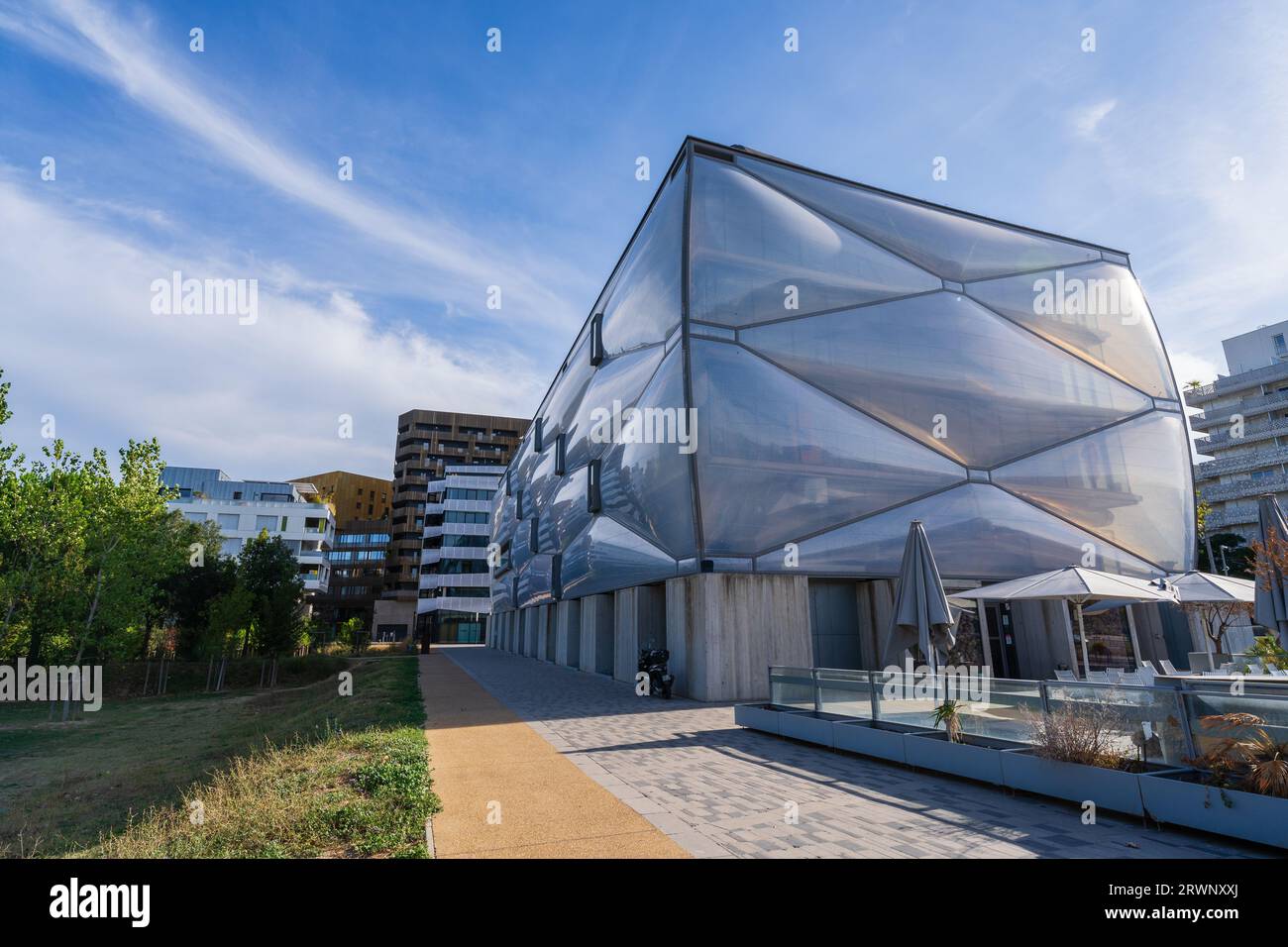 Montpellier, France - 09 18 2023 : Cityscape view of Le Nuage contemporary architecture and design by Philippe Starck in Port Marianne neighbourhood Stock Photo