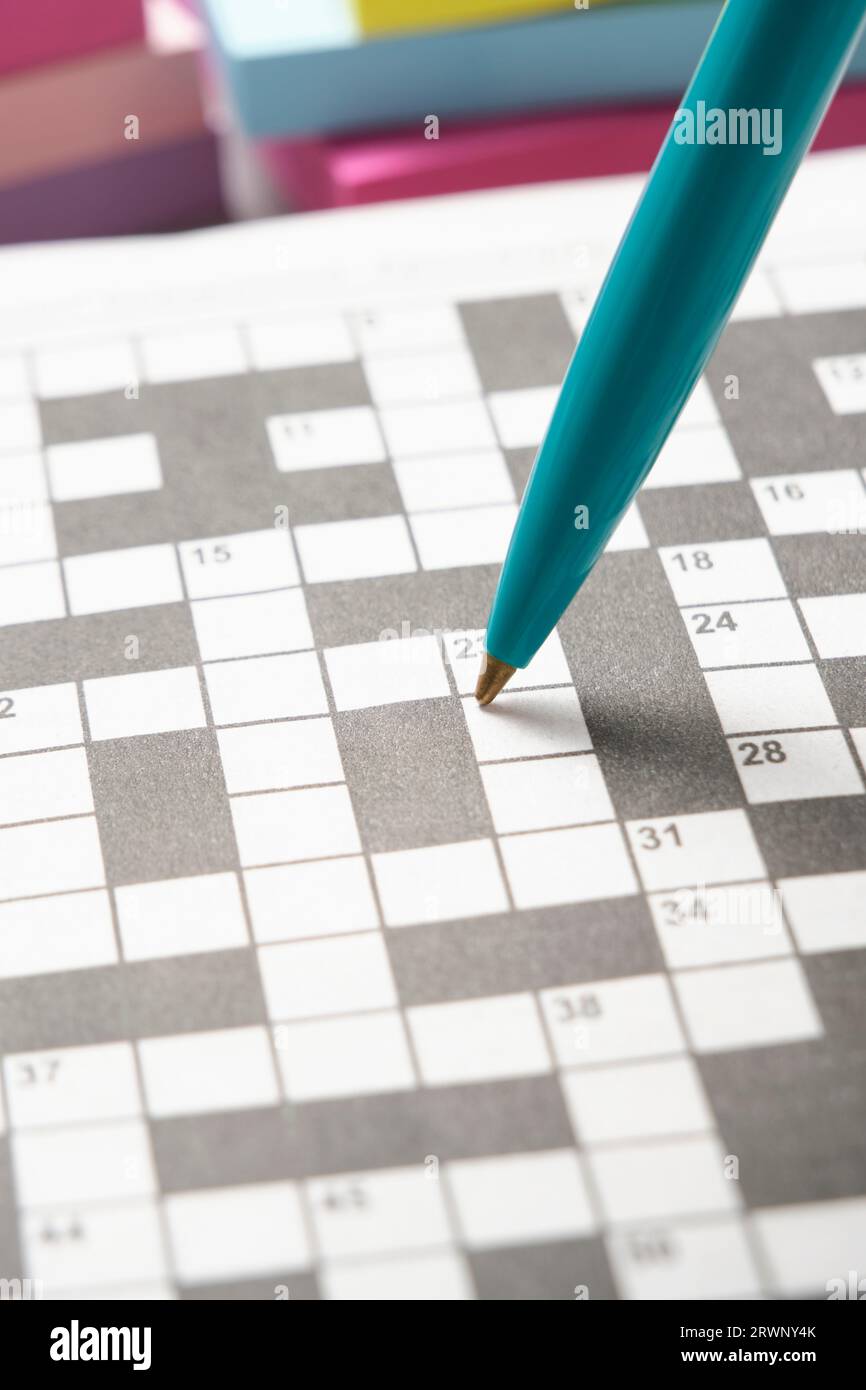 Green ballpoint pen background crossword puzzle sheet Stock Photo Alamy