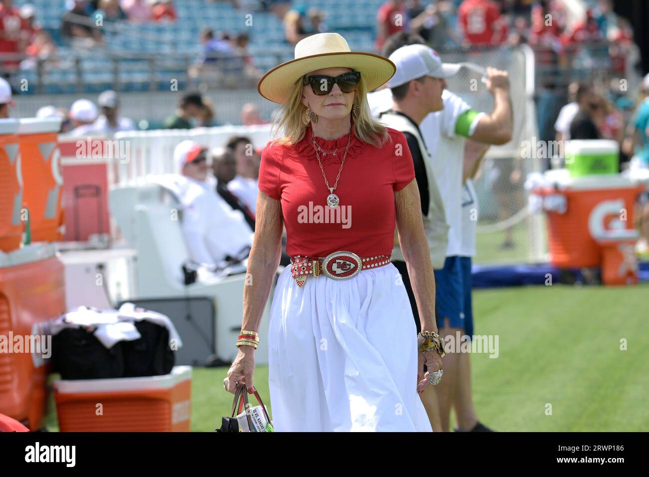 Tammy Reid, wife of Kansas City Chiefs head coach Andy Reid, walks on