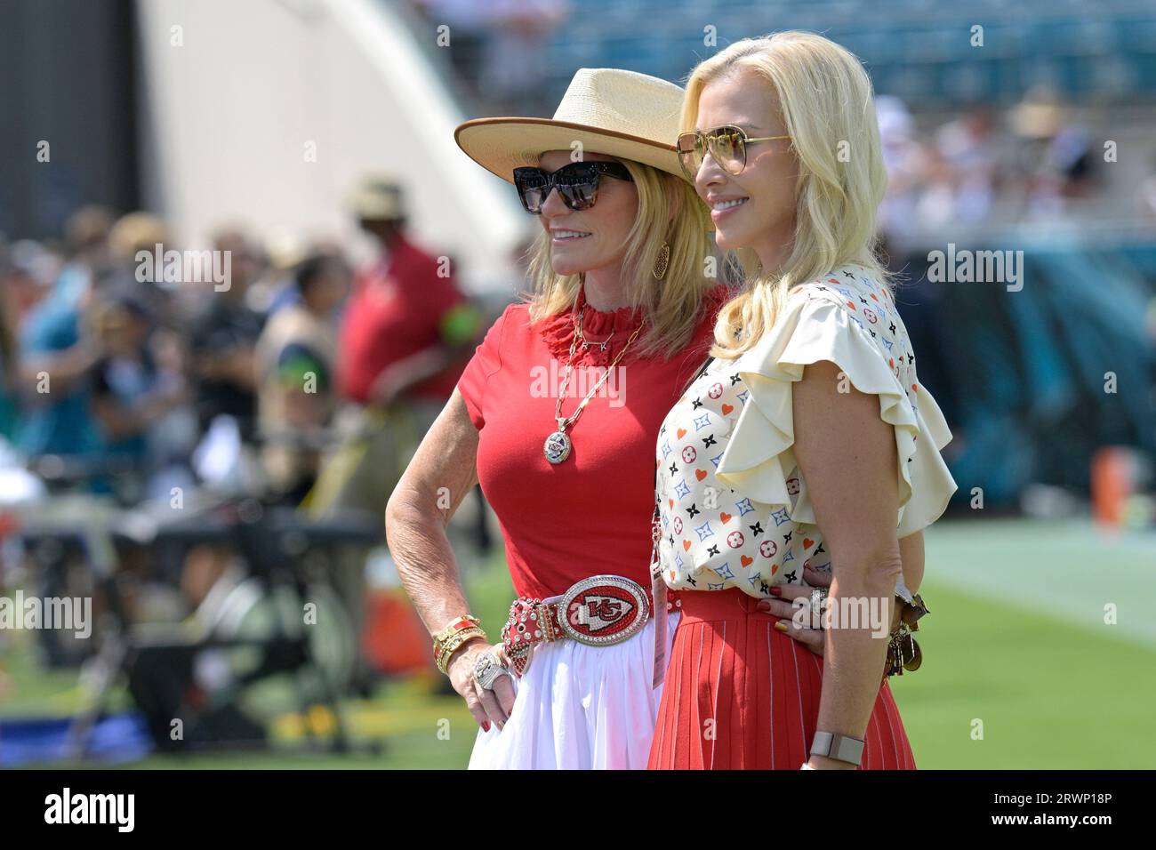 Tammy Reid, left, wife of Kansas City Chiefs head coach Andy Reid, and ...