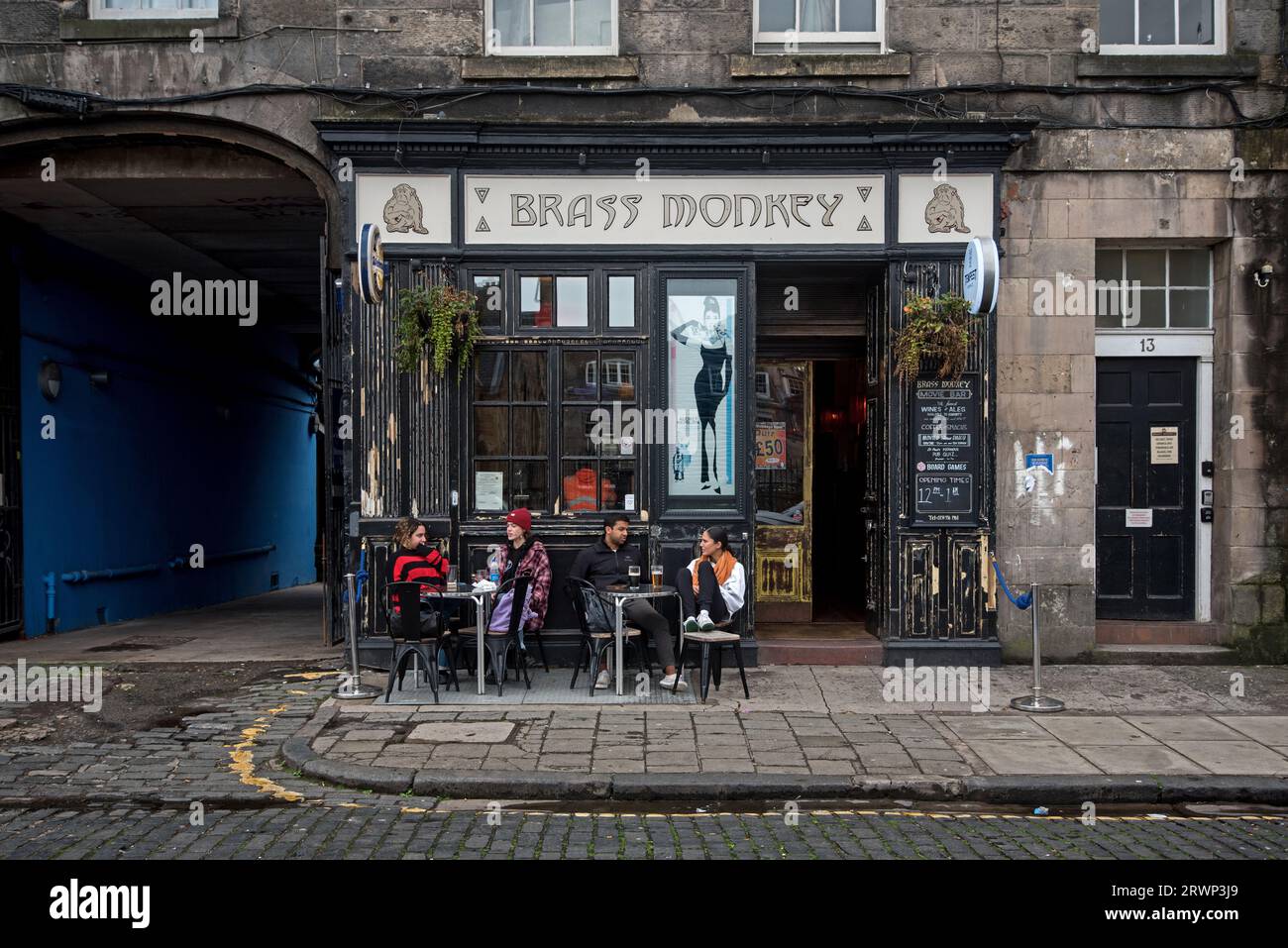 Customers sitting outside the Brass Monkey bar in Drummond Street