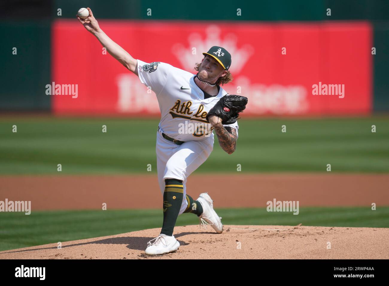 Oakland Athletics pitcher Joey Estes works against the Seattle Mariners