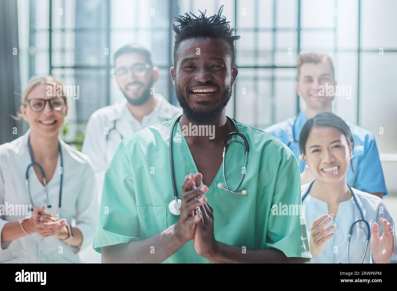Nurses group listening hi-res stock photography and images - Alamy