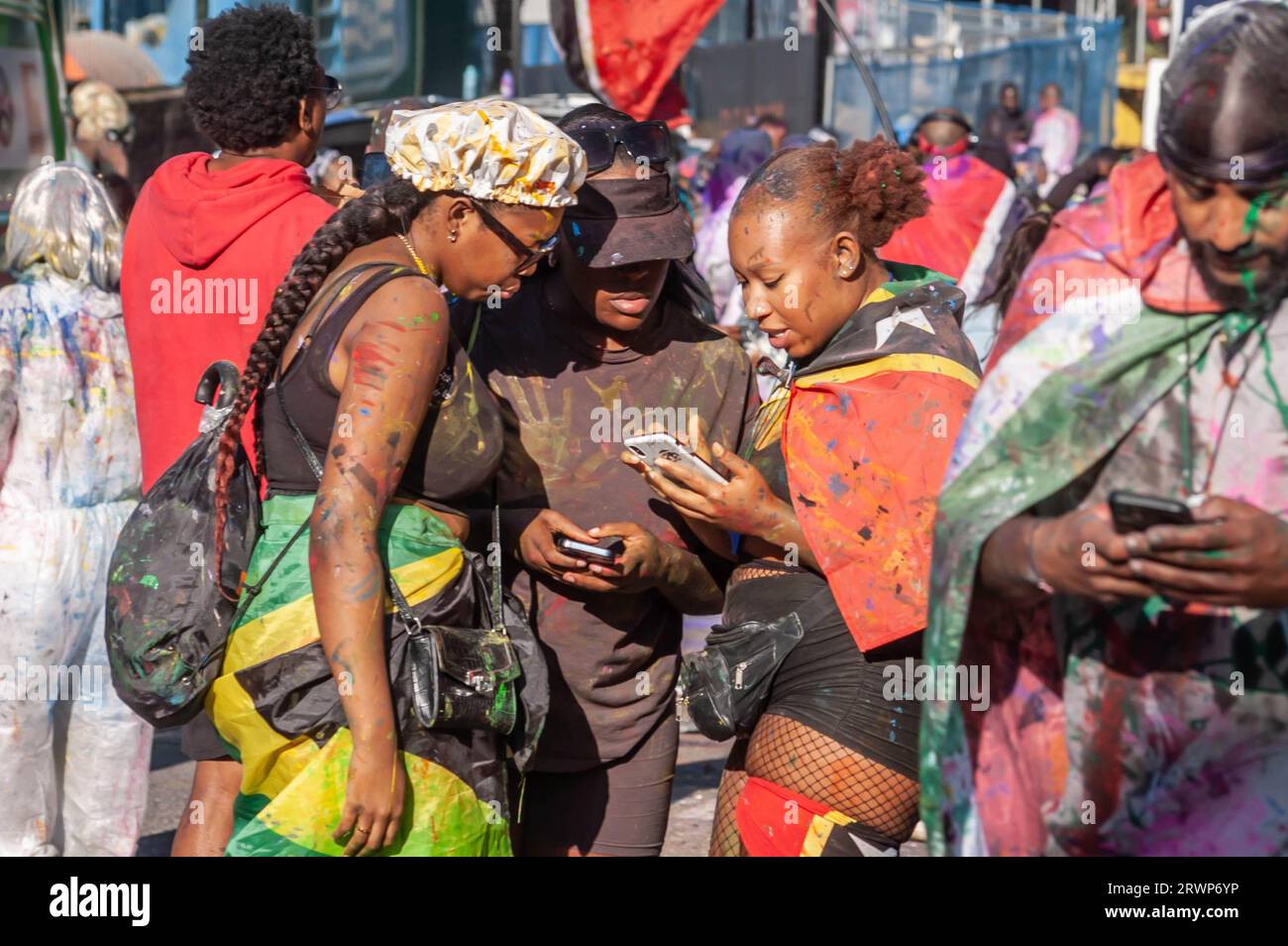 NOTTING HILL, LONDON, ENGLAND - 27 August 2023: People taking part in the opening J'ouvert at Notting Hill Carnival in 2023 2023 Stock Photo