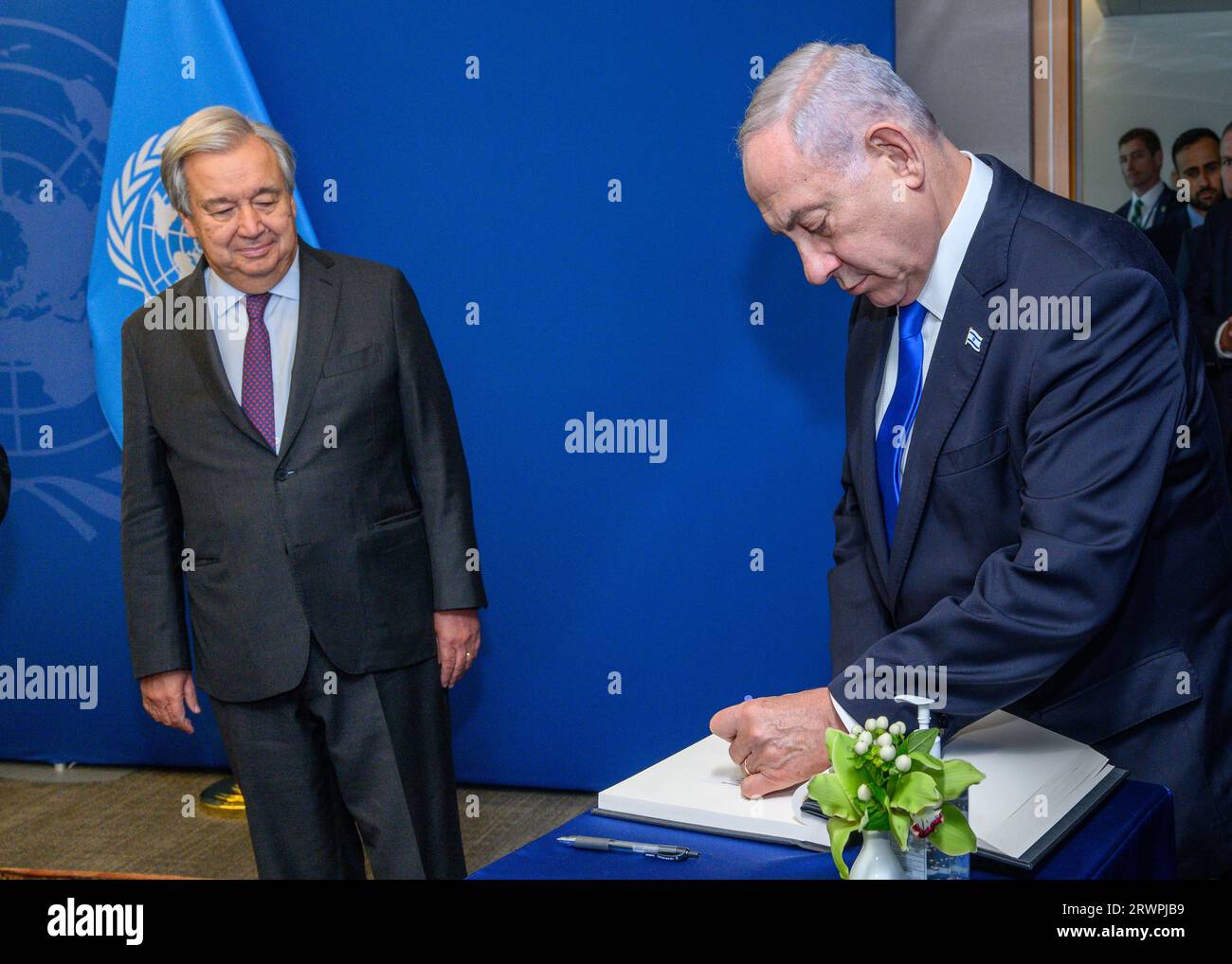 New York, USA. 20th Sep, 2023. United Nations Secretary-General António Guterres watches as Israeli Prime Minister Benjamin Netanyahu signs a ceremonial book during the 78th UN General Assembly at the UN headquarters. Credit: Enrique Shore/Alamy Live News Stock Photo
