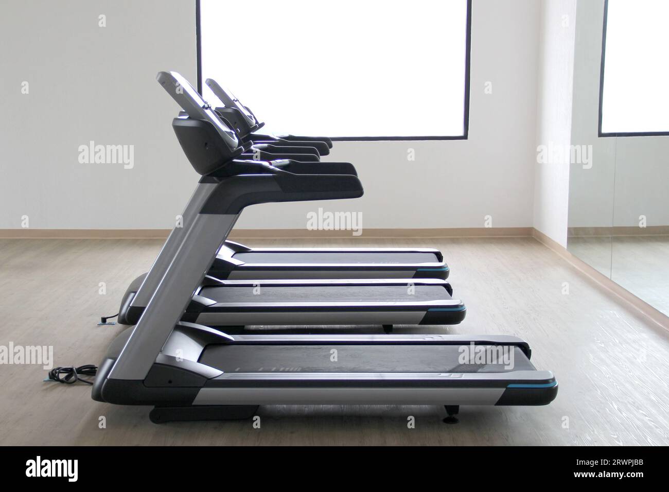 Brand new electric treadmills, exercise apparatus in gym of hotel or