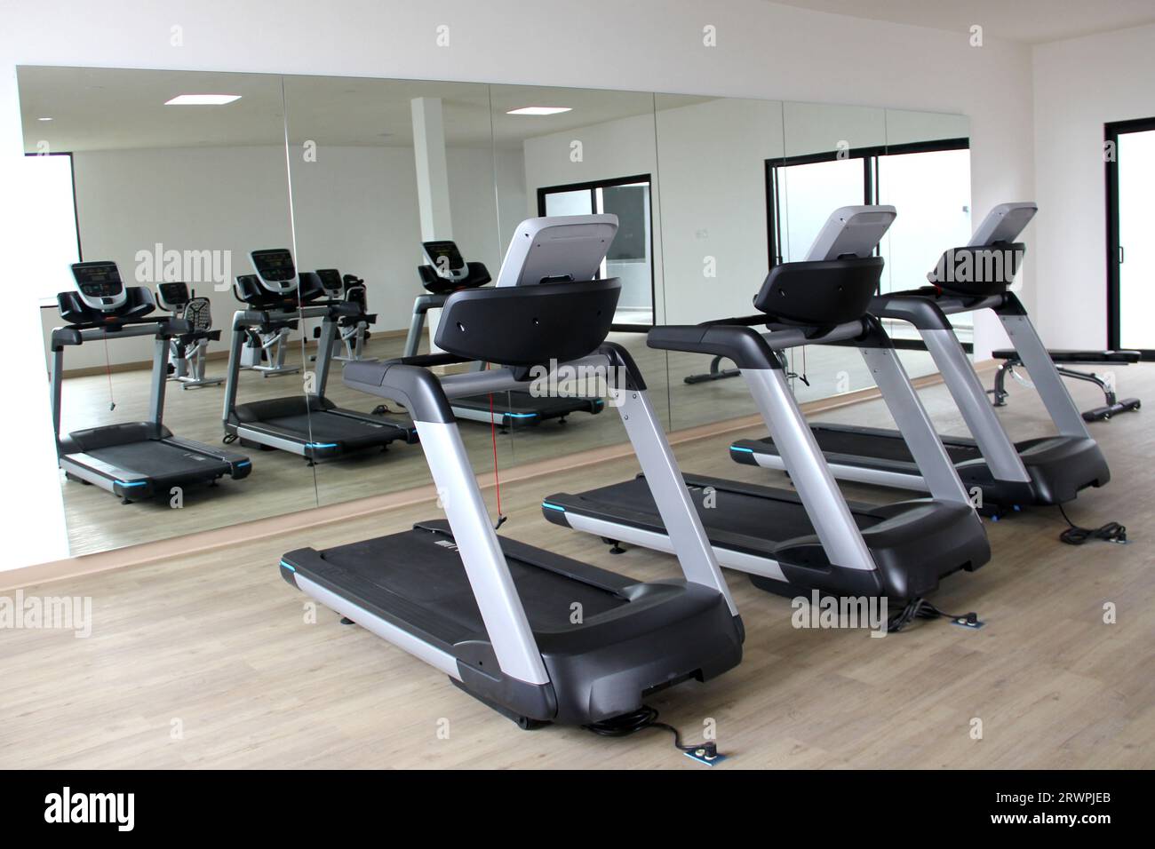 Brand new electric treadmills, exercise apparatus in gym of hotel or apartment building to have