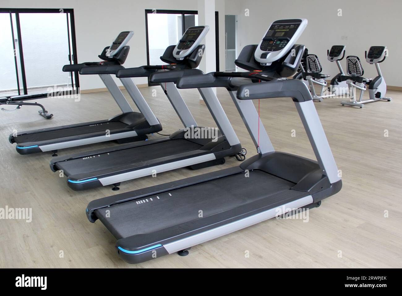 Brand new electric treadmills, exercise apparatus in gym of hotel or