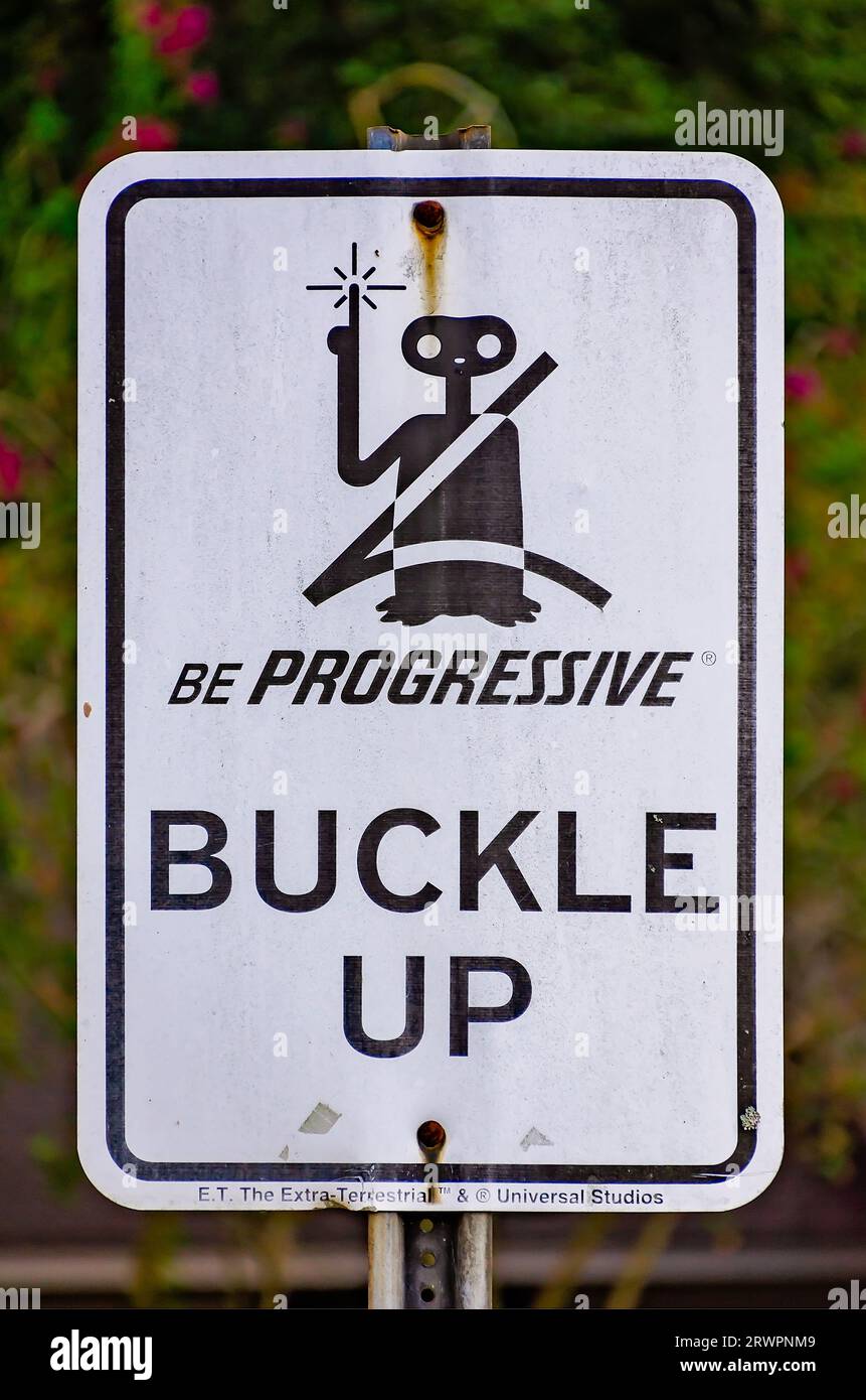 A rare E.T. Progressive Insurance buckle up street sign is pictured outside Nan Gray Davis Elementary School, Aug. 26, 2023, in Theodore, Alabama. Stock Photo