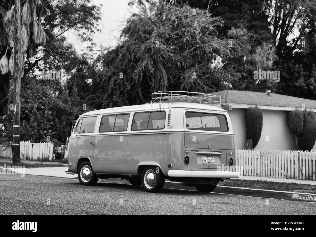 Vintage VW bus parked on suburban California residential street. Stock Photo