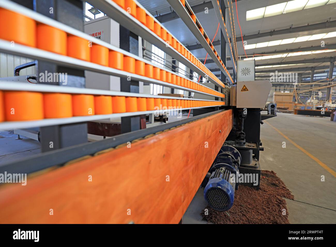 The furniture production line is in a furniture factory in North China