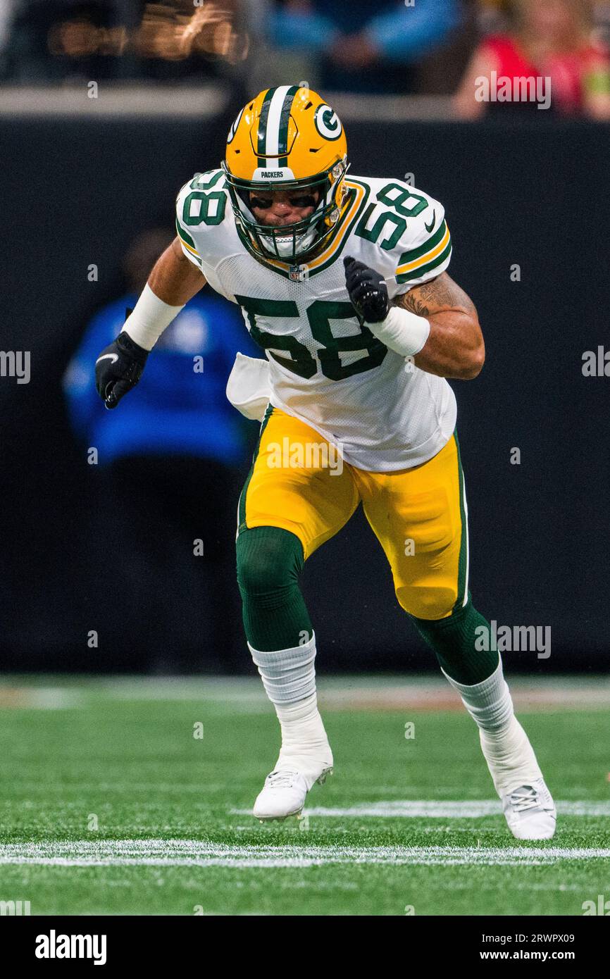 Green Bay Packers linebacker Isaiah McDuffie (58) picks up a loose ball  during an NFL football game against the Washington Commanders, Sunday, October  23, 2022 in Landover. (AP Photo/Daniel Kucin Jr Stock