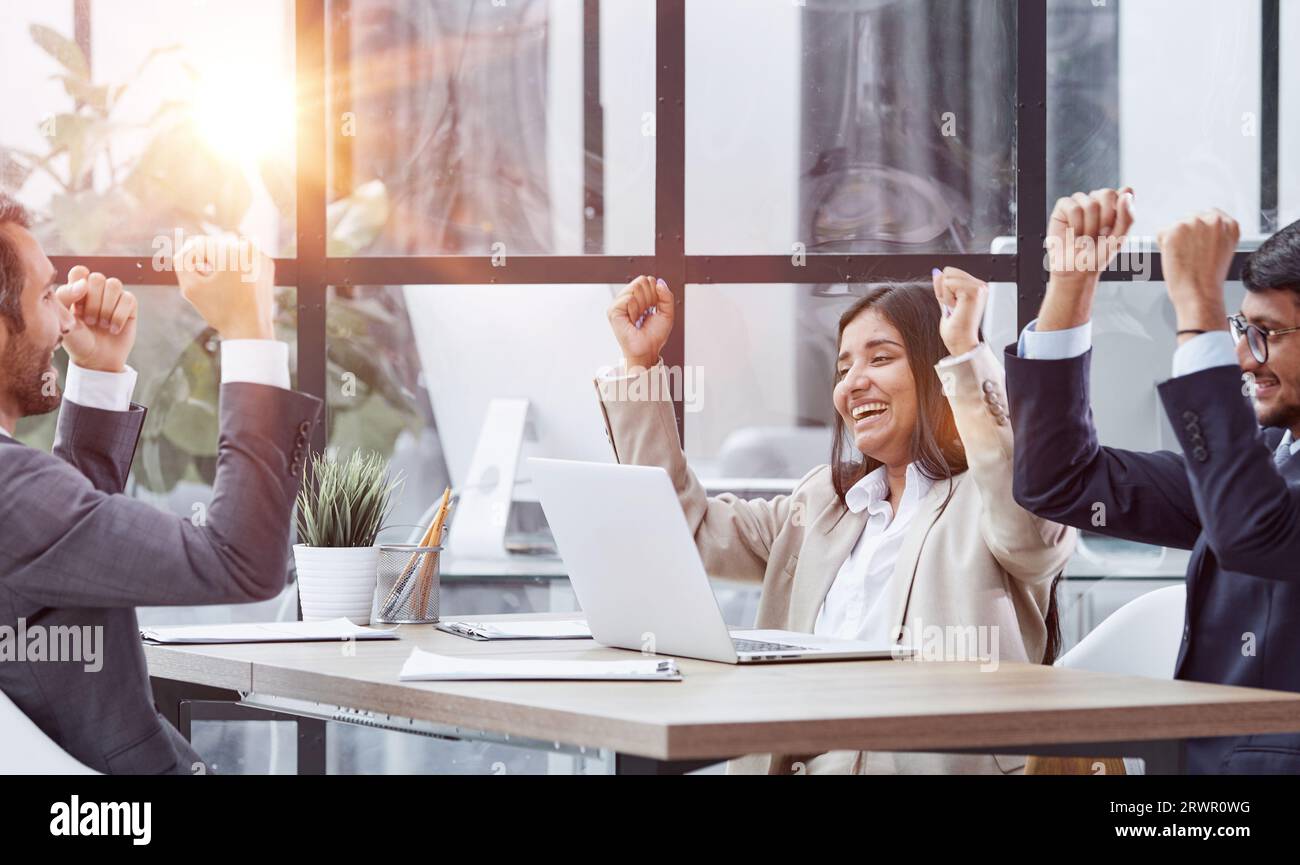 teamwork success win triumph concept at conference table Stock Photo