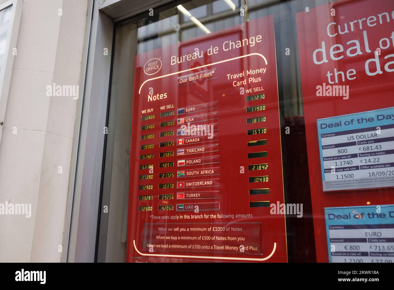 Bureau de Change display in the window of a post office in Central London. Stock Photo