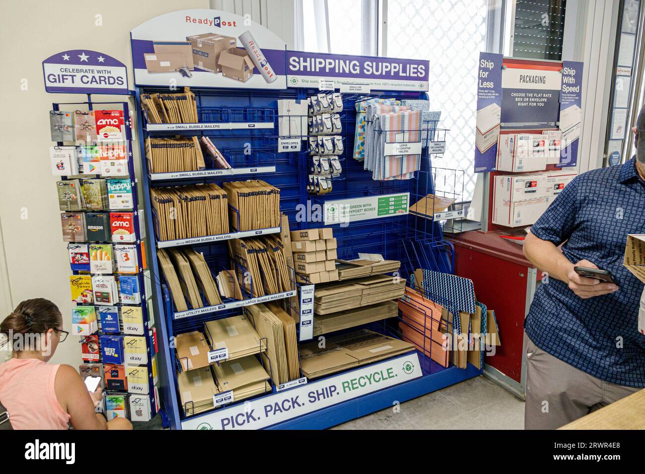 Miami Beach Florida,United States Post Office USPO,inside interior,shipping supplies,gift cards,display sale,Hispanic Hispanics Latins Latinos immigra Stock Photo