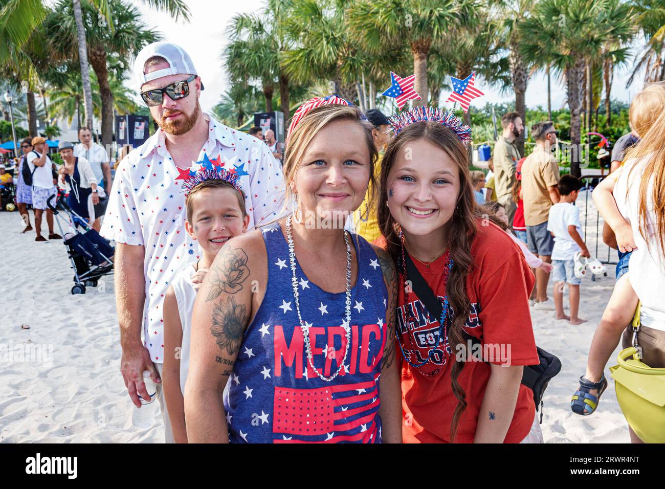 Miami Beach Florida,Ocean Terrace,Fourth 4th of July Independence Day event celebration activity,wearing patriotic hairband,man men male,woman women l Stock Photo
