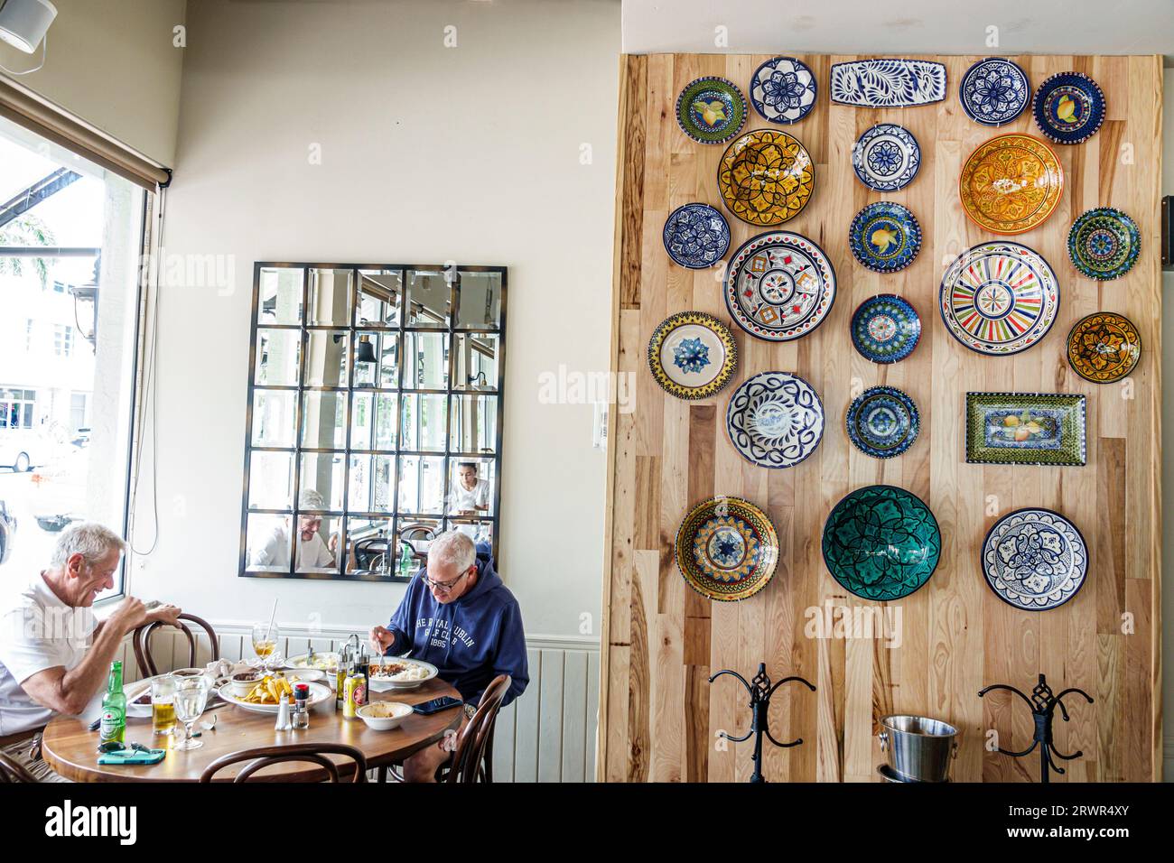 Miami Beach Florida,Sazon Cuban Cuisine,inside interior indoors,restaurant restaurants cafes bistros businesses dine dining eating out,casual cafe bis Stock Photo