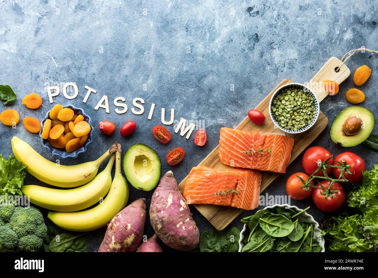 Top down view of various healthy raw foods high in potassium Stock