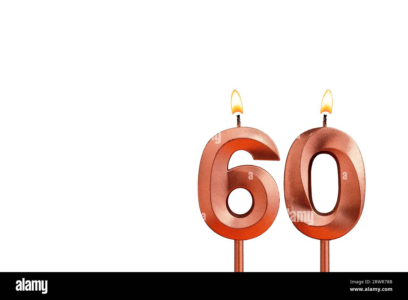 Burning candle number 60 for birthday on white background Stock Photo