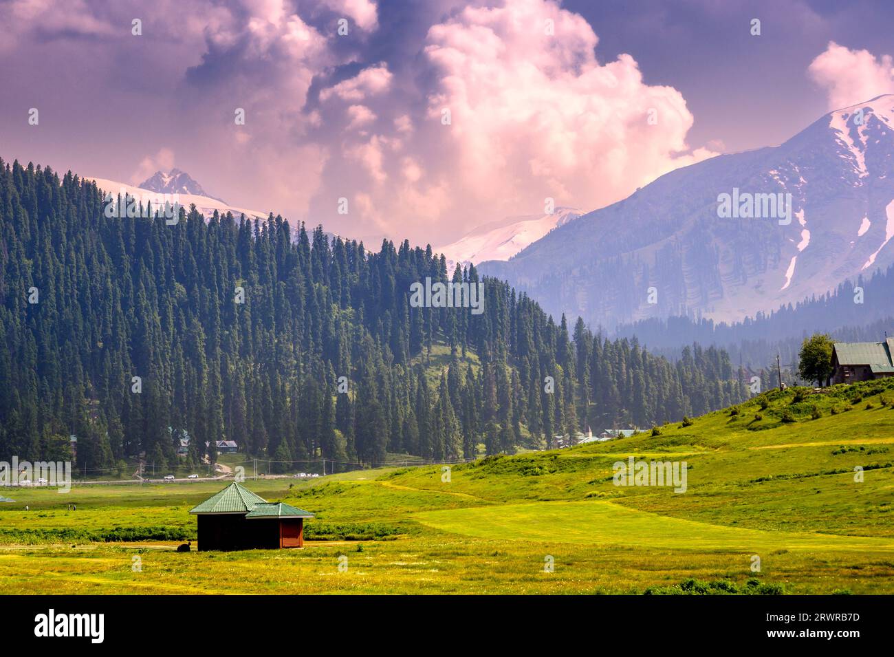 Sunrise in the mountains. Panorama of the mountains. Beautiful scenic Mountain Landscape Of Gulmarg Jammu And Kashmir State India. Stock Photo