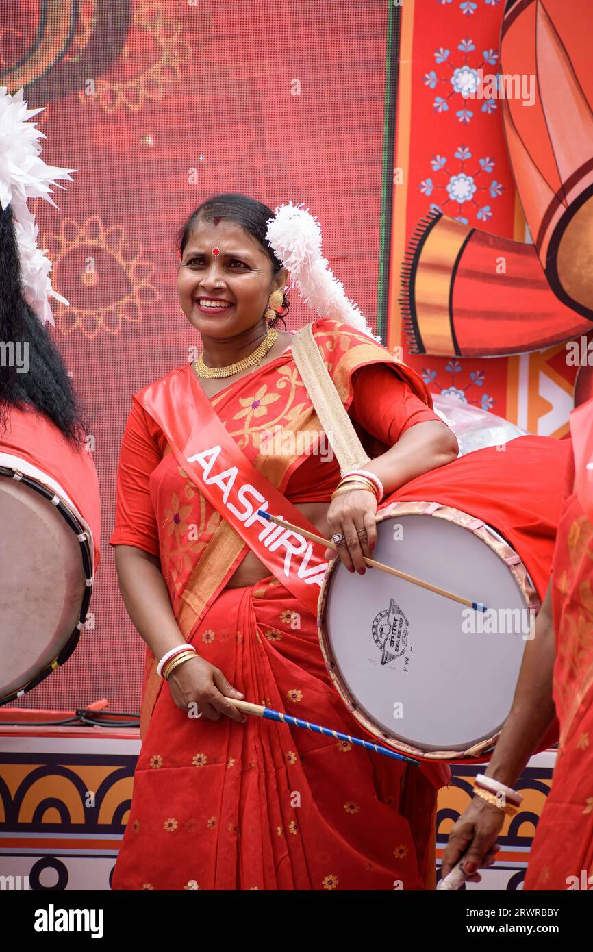 Portrait of an Indian woman wearing a traditional Bengali outfit and
