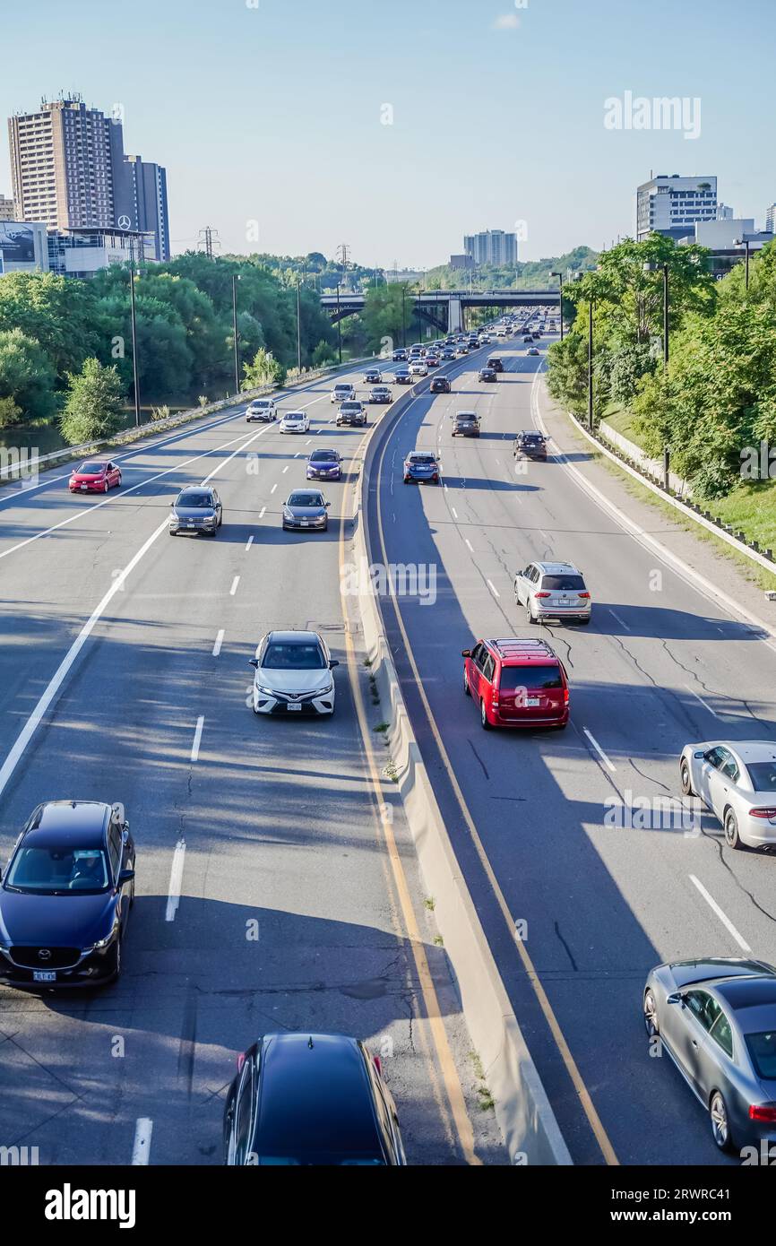 cars on the don valley parkway highway freeway in toronto on sunny summer day Stock Photo