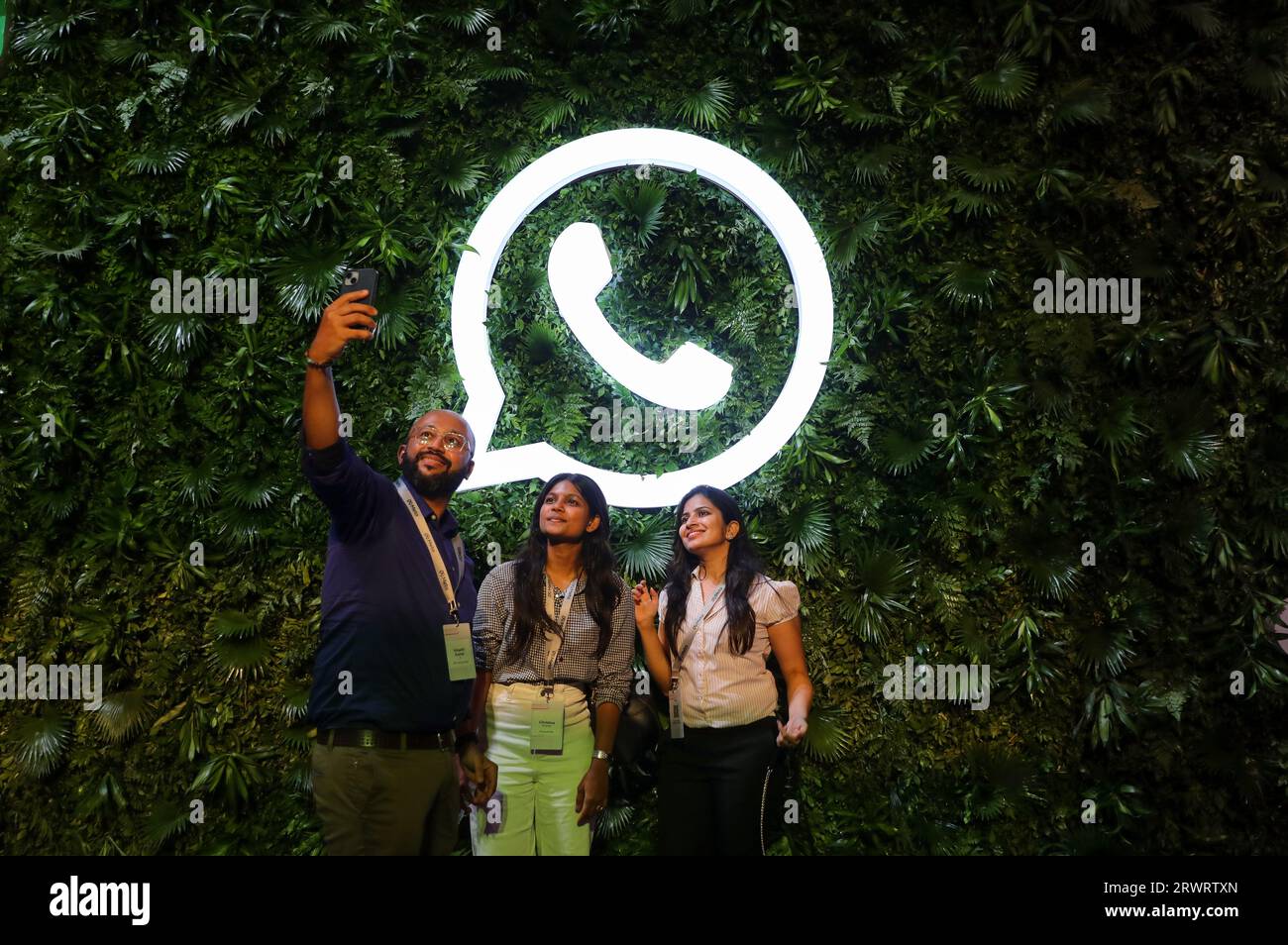 Mumbai, Maharashtra, India. 20th Sep, 2023. People take selfies in front of a Whatsapp logo during a Meta event in Mumbai, India, 20 September, 2023. (Credit Image: © Niharika Kulkarni/ZUMA Press Wire) EDITORIAL USAGE ONLY! Not for Commercial USAGE! Stock Photo